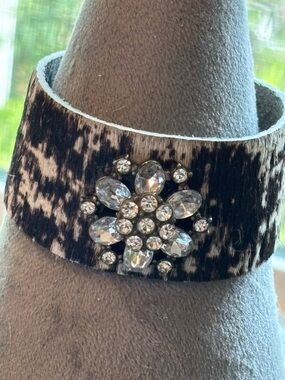 Handmade cowhide bracelet with repurposed vintage crystal brooch!